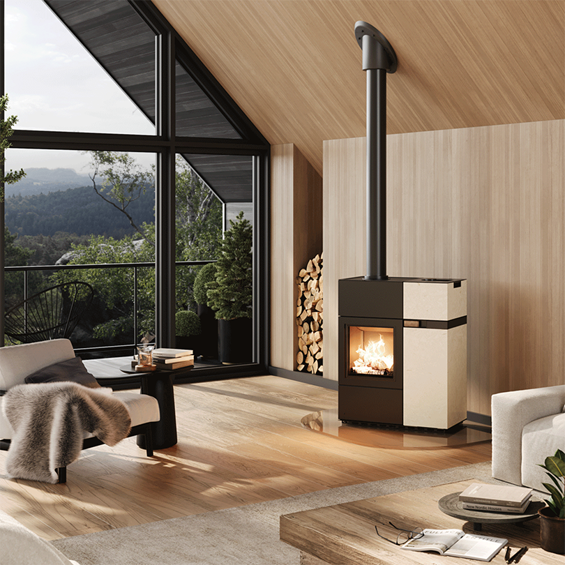 Modern living room with a wood-burning stove and large windows overlooking a scenic view.