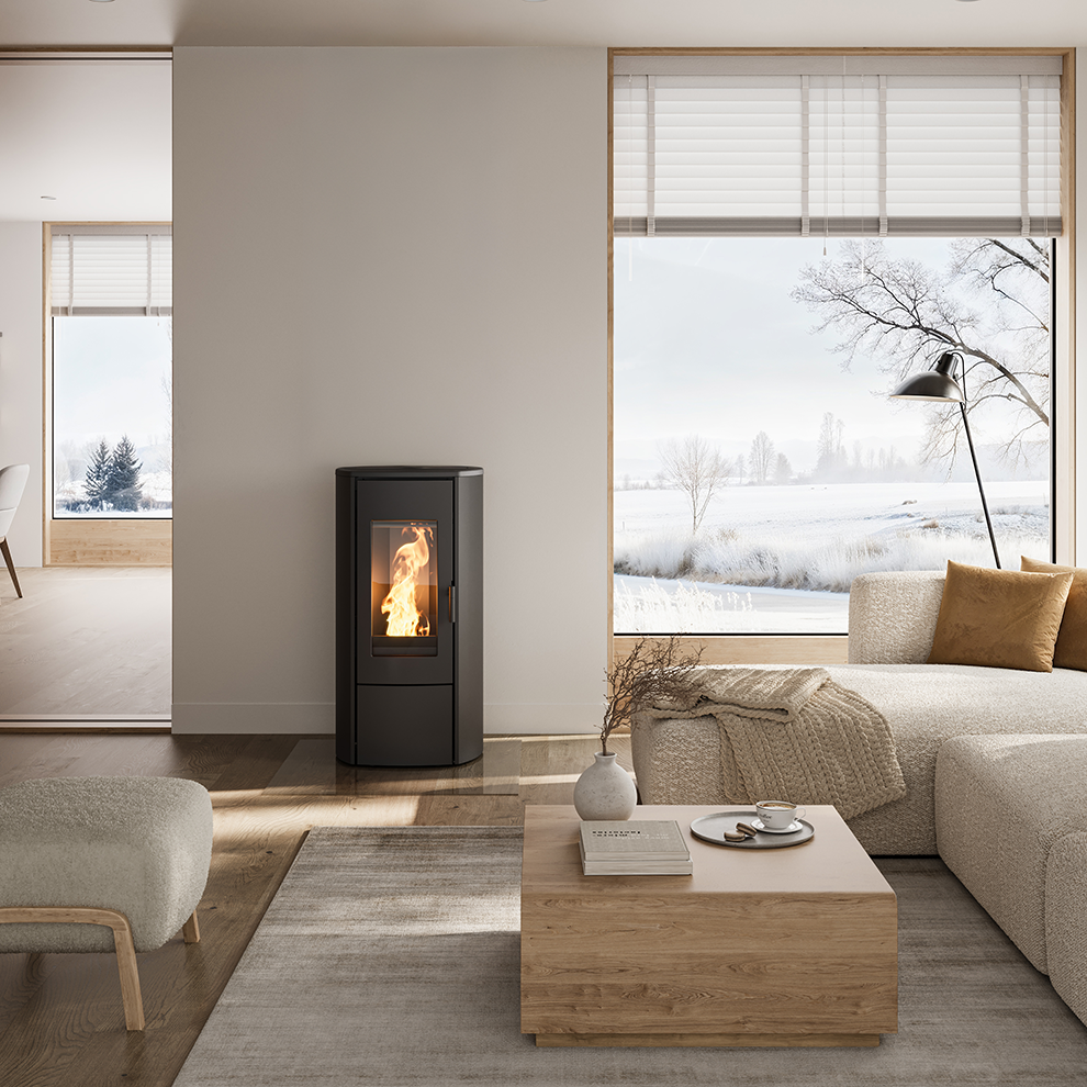 Modern living room with a wood-burning stove, sofa, and coffee table.